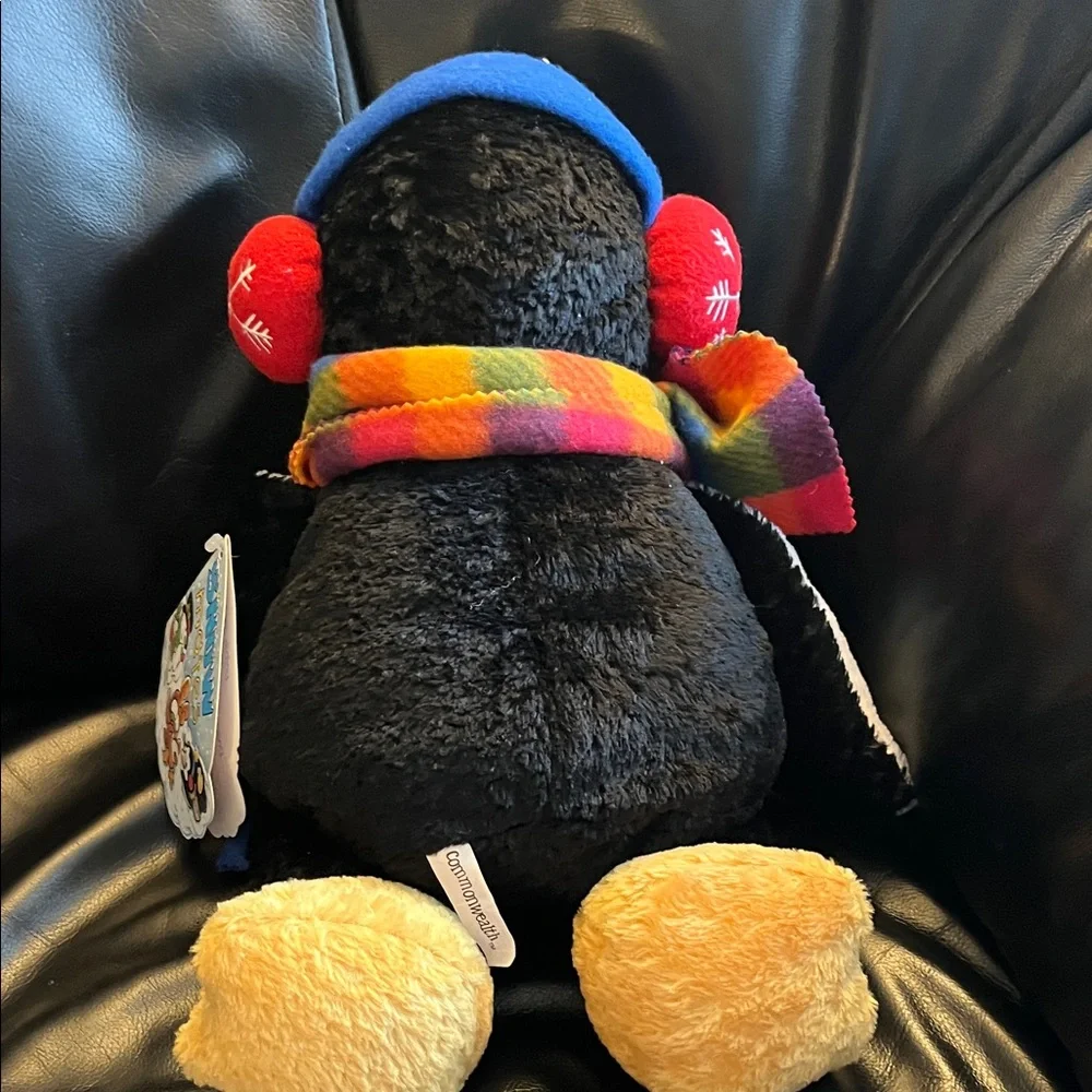 Penguin Plush with Colorful Scarf and Red Earmuffs